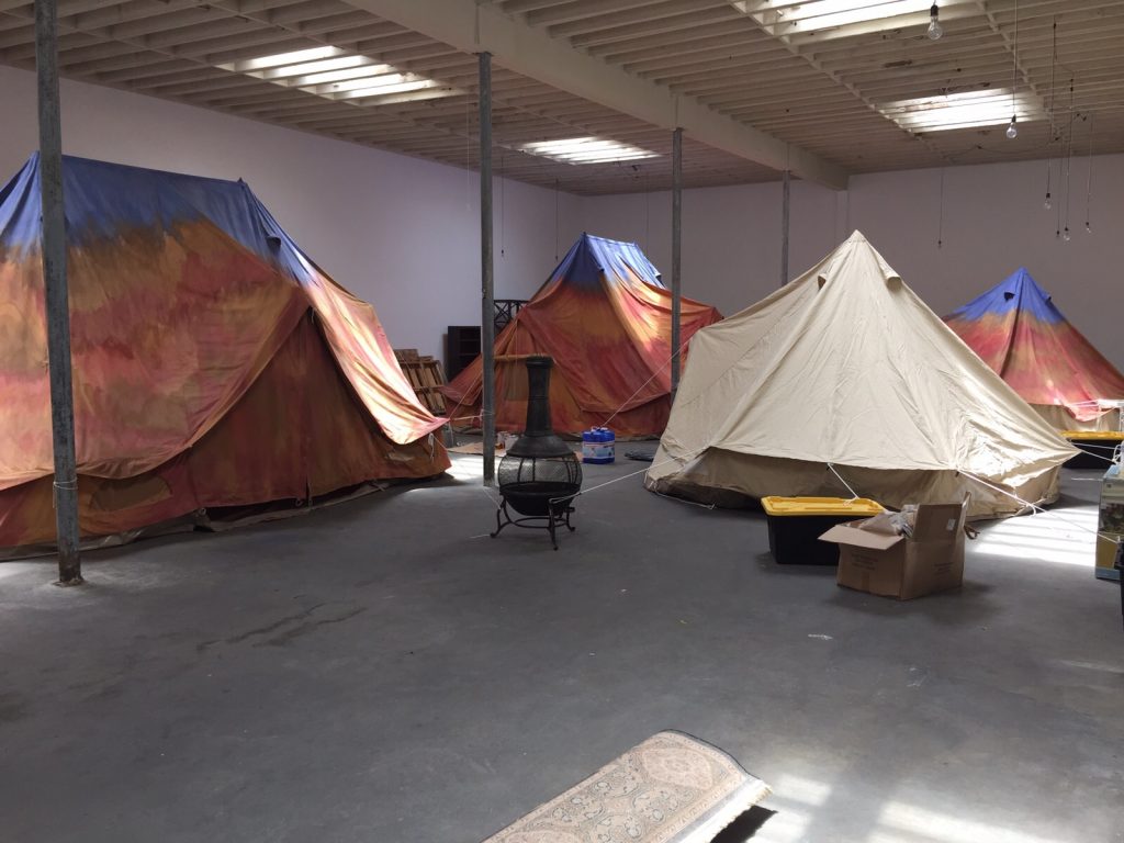 Bell Tents being painted by scenic artists in LA