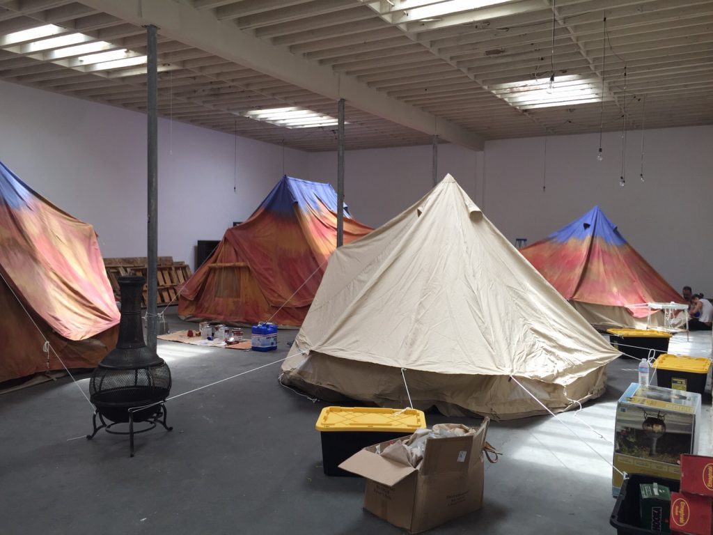 Bell Tents being painted by scenic artists in LA